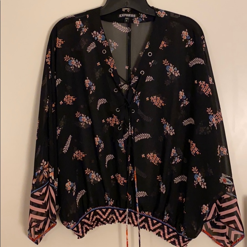 Express top. Black with pink and salmon florals.